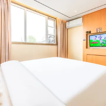 Youyou Light Luxury Hotel (Yonghe Palace Nanluoguxiang Branch) Отели рядом с достопримечательностью «Станция Andingmen»