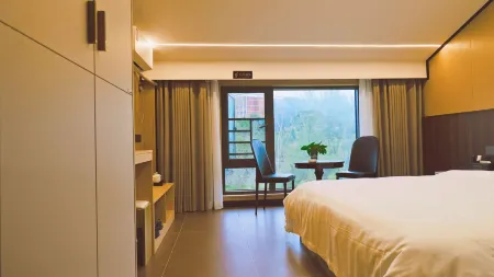 Xinhui Hotel (Meitan Qiushi High School) Отели рядом с достопримечательностью «Meitan International Hotel Hot Spring»