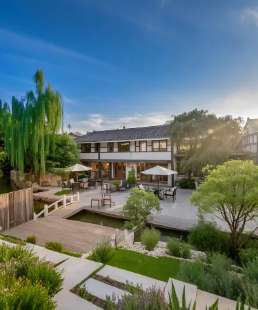 Huasu Boutique Hostel Отели в г. Мяньчжу