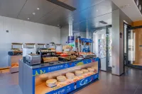 Rizhao Xingdao Fantasy Paradise Homestay - servizio colazione