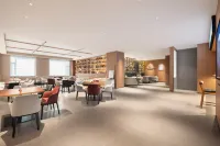 Yun Nan She Holiday Hotel (Qiqiqiao Shiqiao Market Branch, Jinzhou Railway Station) - petit déjeuner