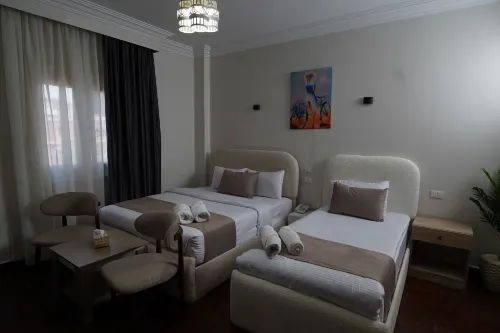 Triple garden view hotel - موقف سيارات