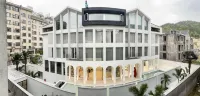 Hengdian Xixi Guesthouse Отели рядом с достопримечательностью «Цюньмин Сен-Парк Шай-Ху»