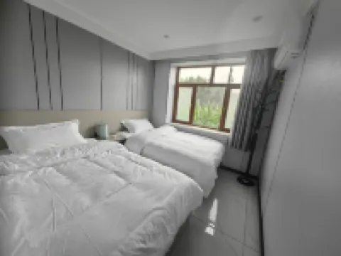 Fuyuan Zhejie Sister Homestay (Nangang Hezhe Ethnic Village)