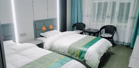 Haolaiwu Business Hotel (Wudaoliang) Отели в г. Цюймалай