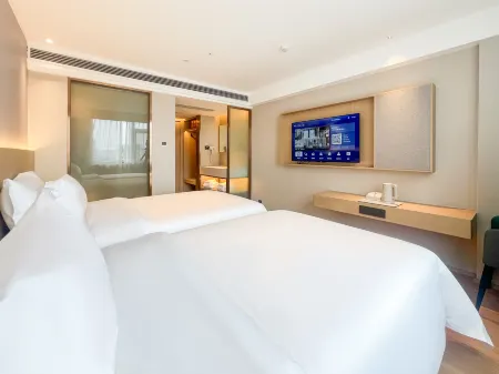 Sanhe Hotel (Wanda Plaza) Отели рядом с достопримечательностью «Shangrao Botanical Garden»