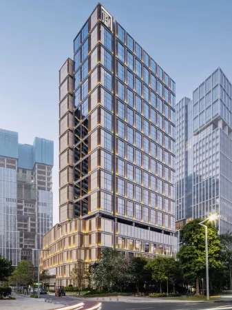 Echarm Hotel (Haikou Guoxing RT-Mart Provincial Government) Отели рядом с достопримечательностью «Hainan Institute of Science & Technology»