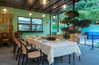 Hearing Homestay (Yulonghe Shanshui Avenue)