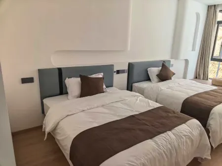 Yuexi Anzhiruosu Homestay Отели рядом с достопримечательностью «Mingtang Mountain»