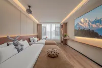 Ximan · Jade Dragon in Sight | Snow Top · Sunrise-Gilded Golden Mountain View Homestay