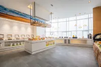 Xincheng Hotel (Yantai University International Expo Center Branch) - servizio colazione