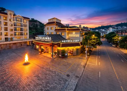 Mijng Qiyuan Minority Theme Hotel - Park Yeri