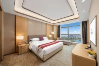 Rezen Longuu Hotel (Dengzhou Municipal Government & Tuanhe National Wetland Park Branch) - موقف سيارات