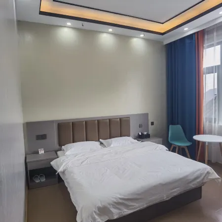 Heqing County Beiya Xingfu Hotel