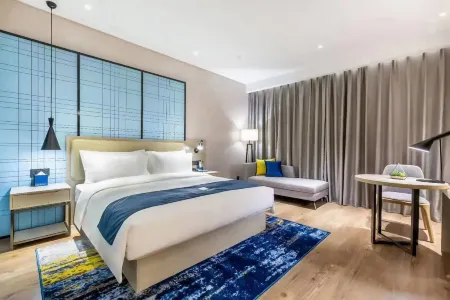 Echarm Hotel (Tongshan Niutoushan Park) Отели в г. Туншань