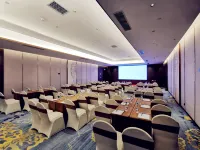 Huajian Meisu Hotel (Xinyang Railway Station Tianrun Plaza)