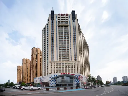 Shanhe Puyin Hotel (Xinyang East high speed railway station store) Отели рядом со станцией Xinyang East Railway Station