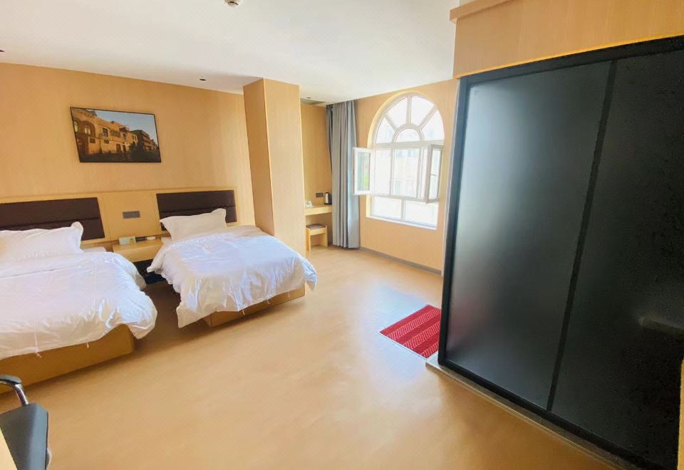 [카시 싱천 완리 호텔의 깔끔한 객실 사진]