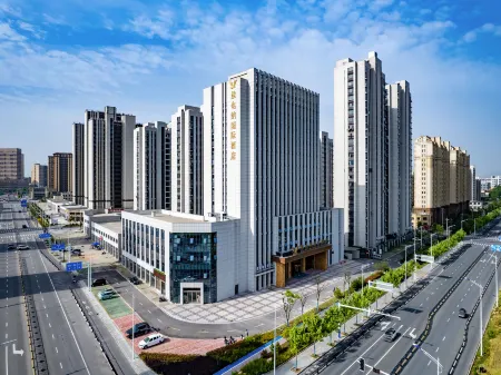Vienna International Hotel (Taihu Puxian Road) Отели в г. Тайху