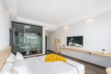 Chun Shu mu yun linhai boutique minsu (Dali caicun wharf branch)