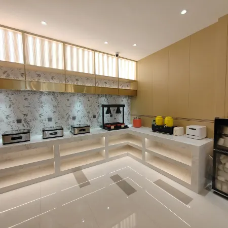 Magnotel Business Hotel (Longjiang Zhigang Plaza)
