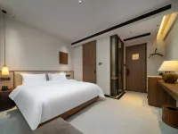 Xishuangbanna Jinghong Yakatu Theme Inn (Mengle Dafo Temple) - Varme kilder