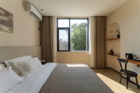 EDEN YARD Отели в г. Цзиндечжэнь