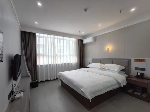 Yannian Hotel Hotel di Wujiaqu