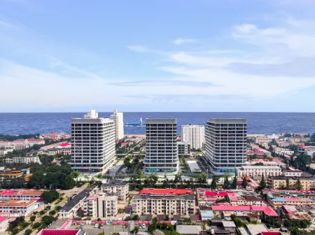 Guan Chao Xin Run Hotel (Nandaihe Xianluo Island Branch) Отели рядом с достопримечательностью «Hebei Institute of International Business and Economics - Comprehensive Building»