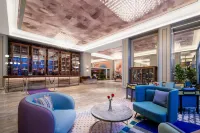 Mercure สวนดอกไม้เมืองร้อน สิบสองปันนา - ที่มีที่จอดรถ