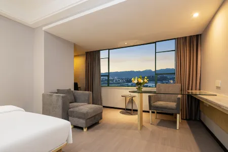 Xinbao Lijing Hotel (Shayang Hehua Road Food Street) Отели в г. Шаян