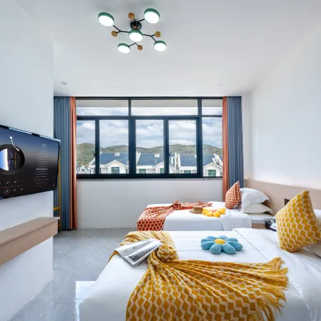 sanya Green Homestay(Nanshan Temple Branch) Отели рядом с достопримечательностью «Храм Наньшань»