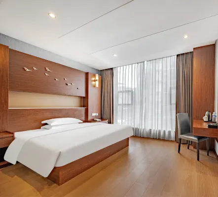 Guangzhou Jiulong Hotel (Luodian Mingzhu Central Plaza) - Bãi đậu xe