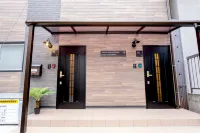 Nestay terrace house Osaka Tsutenkaku Hotel di Nishinari Ward
