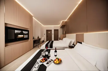 Mando Luxury Smart Audio-Visual Hotel (Weihai Huoju 8th Street International Coastal Baths) Отели рядом с достопримечательностью «Xiaoshidao Fishing Beachcombing Park»