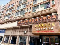 Xiju Business Apartment (Baijiao Development Zone Branch) Hotel di Distrik Doumen