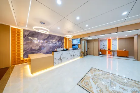 Zhongshan Xingye Shangpin Hotel (Hedong Commercial City Branch) Отели рядом с достопримечательностью «Ten-Mile Gallery»