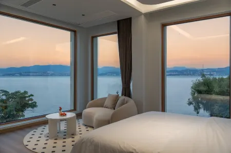 Floral Hotel · Gongdu Xinghai Hotel Отели рядом с достопримечательностью «Plateau Pearl Tower»