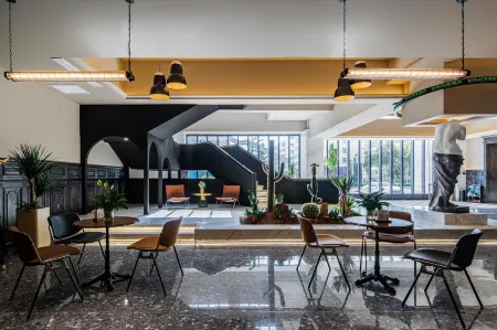 REZEN HOTEL Отели рядом с достопримечательностью «Weichai University»