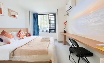 Xunguang Luxury Projection Apartment (Nanning Longhu Qingxiu Tianjie)