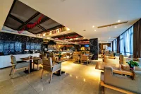 Huashuyi Hotel (Huzhou Zhili Wuyue Plaza China Children's Wear City) - فطور