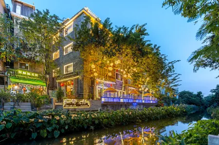 Jinyiju (Pazhou Huangpu Gugang Branch) Отели рядом с достопримечательностью «Shuiyue Temple (West to Guangzhou Municipal Facility Cashier Zhongshan Avenue Charging Station)»