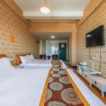 Xinghai Homestay (Zhengzhou Erqi Square Subway Station) Отели рядом с достопримечательностью «Huo Min Middle School Education Group (Cheng North Road)»