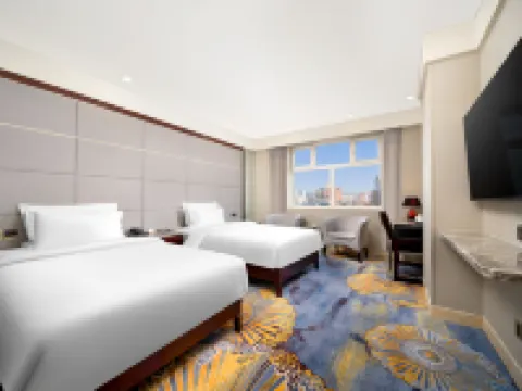 Sunnydate International Hotel (Mudanjiang Railway Station Branch) Hoteles en Mudanjiang