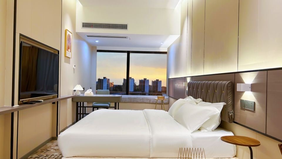 Qihuan Apartment Hotel