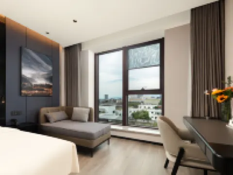 โรงแรมเอทัวร์ ถนนจินฟาน มหาวิทยาลัยอาชีพ จินหัว โรงแรมใกล้ทะเลสาบฮอน คีม