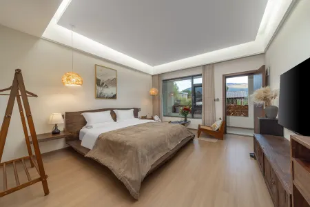 Good Times·Meet the snow mountain Courtyard(Baisha Old Town） Отели рядом с достопримечательностью «Lijiang Snow Mountain Falcon Valley Scenic Area»