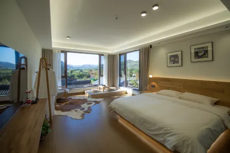 Xinchang Fenglan Xiyu Homestay (Shijiu Peak) Отели рядом с достопримечательностью «Qianzhang Canyon»