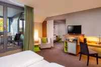 Mövenpick München Airport Hoteles en Hallbergmoos