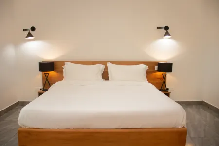 Hotel Residence Feuille Отели рядом с Аэропорт Пуэнт-Нуар Агостино Нето